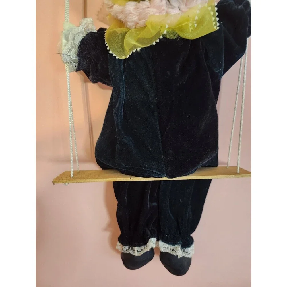 Vintage Clown Doll Sits On Wooden Swing Ceramic Head